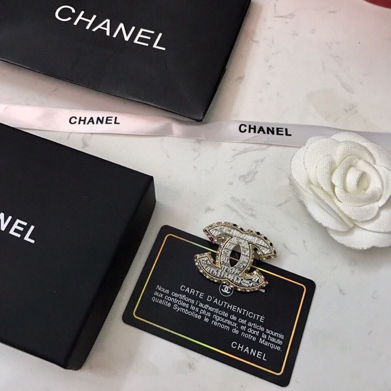 Ch**el brooches